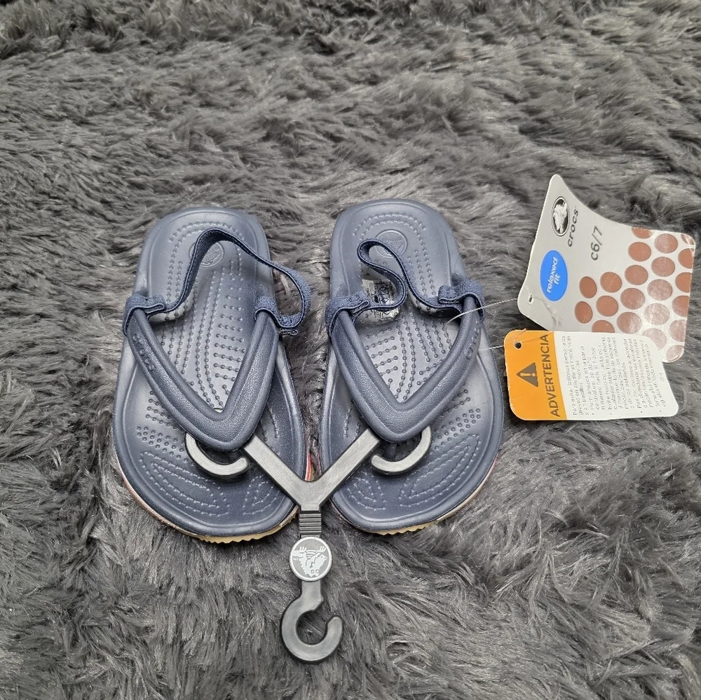 Crocs- Navy Retro Kids Flip Flop. Size 6-7. NWT!